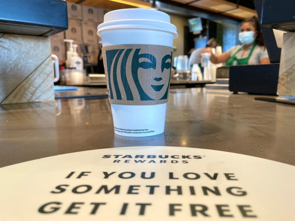 The Starbucks logo is displayed on a cup at a Starbucks store on October 29, 2021 in Marin City, California.