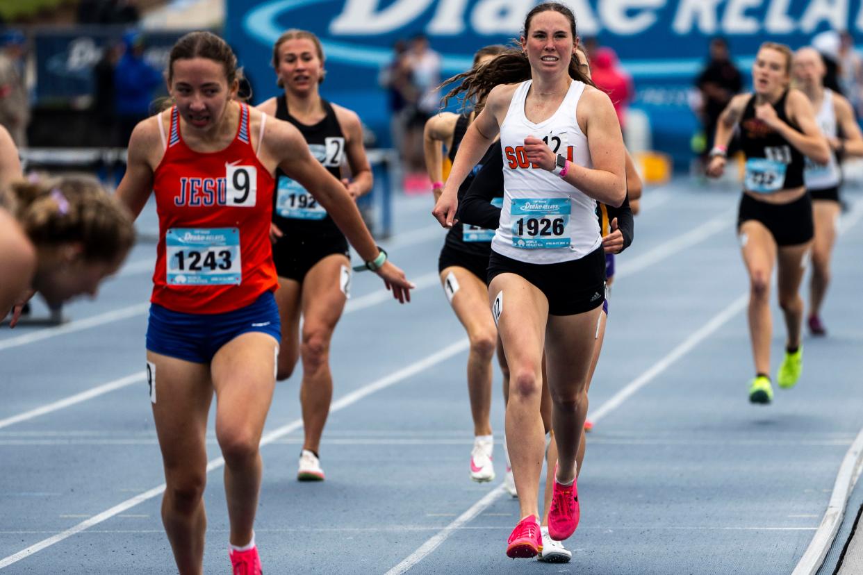 Solon's Gracie Federspiel runs the 800 meter run during the Drake Relays at Drake Stadium on Friday. She finished the event in ninth place.