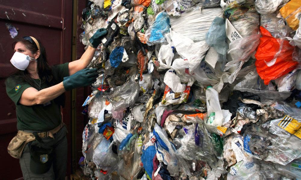 Household waste imported from Britain that was improperly labeled as recyclable plastic, in Santos, Brazil.