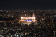 <p>Fireworks are displayed over the Olympic Stadium during the closing ceremony of the Tokyo Olympics on August 8, 2021 in Tokyo, Japan. (Photo by Carl Court/Getty Images)</p> 