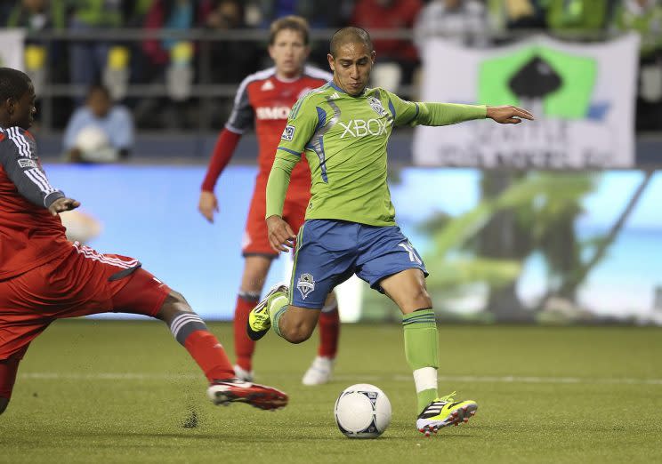 David Estrada #16 of the Seattle Sounders scores his third goal of the match against Aaron Maund #21 of Toronto FC at CenturyLink Field on March 17, 2012 in Seattle, Washington. (Photo by Otto Greule Jr/Getty Images)