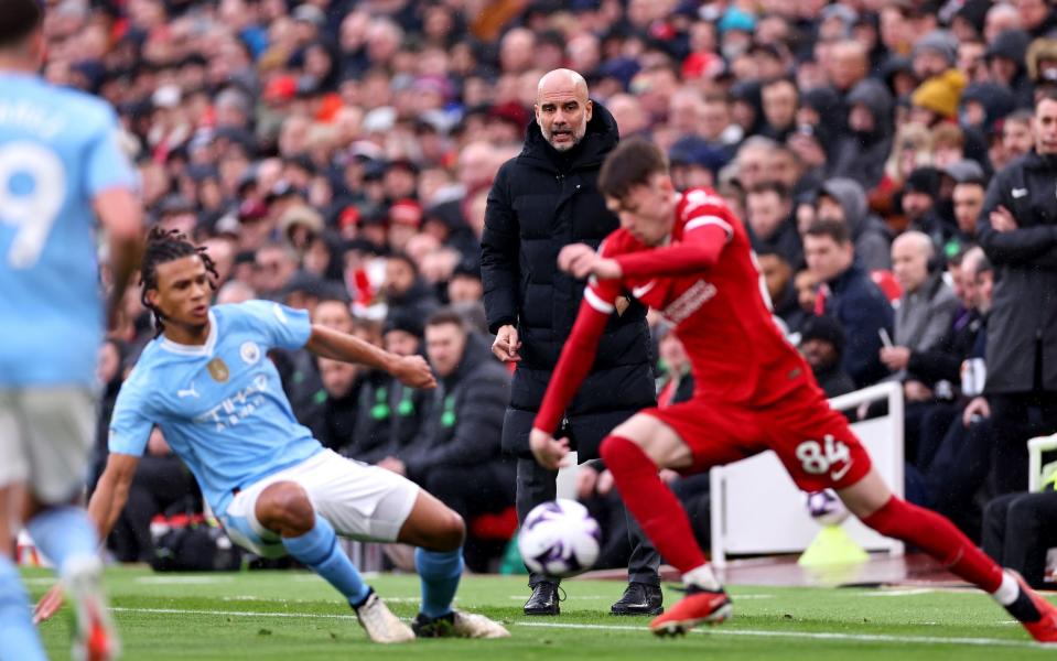 Pep Guardiola watches on from the touchline