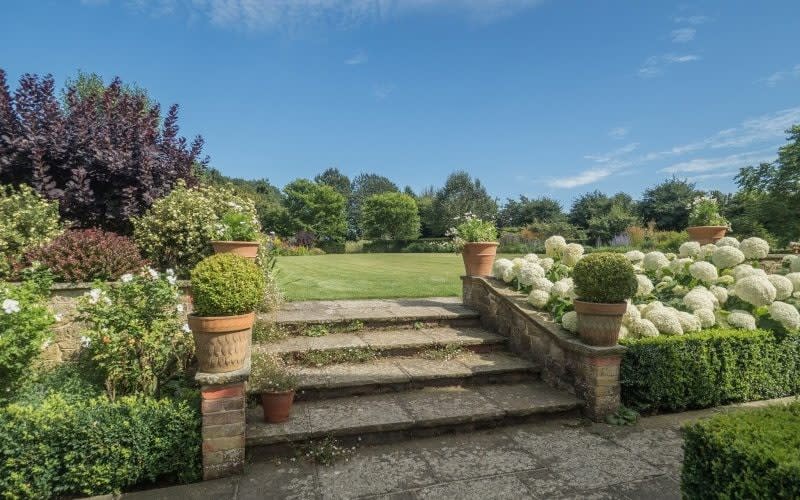 The spacious garden of Thakeham Place Farm has evolved over 30 years and now has a rich array for visitors, especially in high summer - National Garden Scheme