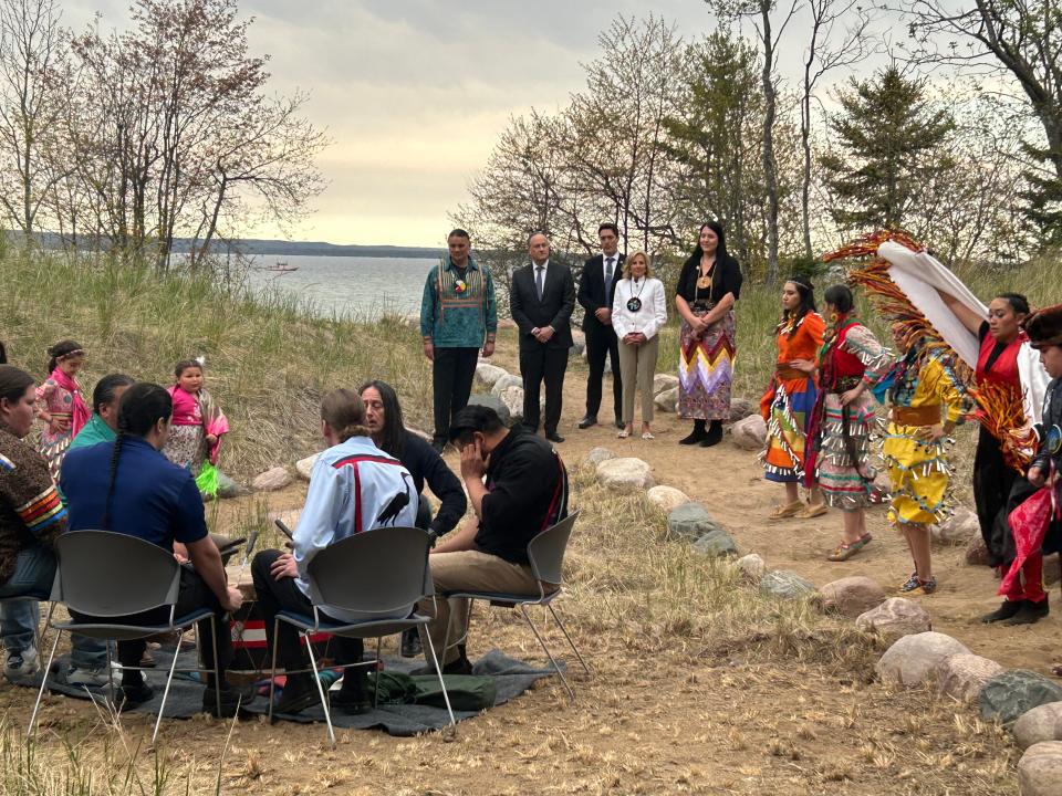 Mission Hill Drum, a Bay Mills Indian Community drum circle, performs alongside traditional dancers as First Lady Jill Biden and Second Gentleman Douglas Emhoff visit Bay Mills Community College on Thursday, May 16, 2024.