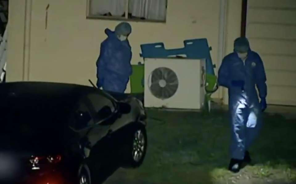 Detectives at the scene of the stabbing death of a 53-year-old man. Source: Nine News