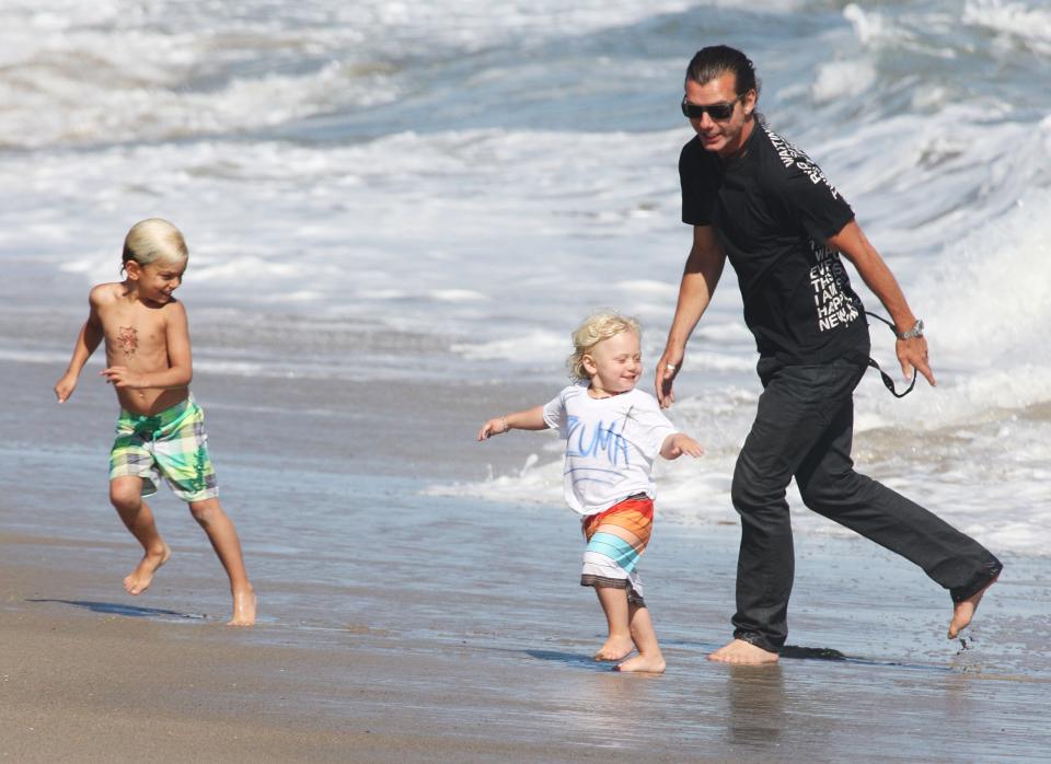 Gavin Rossdale chases after son Zuma on the beaches in Malibu. He and Gwen Stefani spent their 2011 Memorial Day with their boys having some fun in the sun.