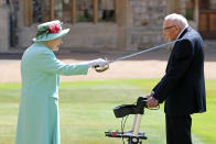 <p>The Queen bestows a knighthood on Captain Sir Thomas Moore during a ceremony at Windsor Castle on 17 July 2020 for his fundraising efforts during the coronavirus pandemic. (PA)</p> 