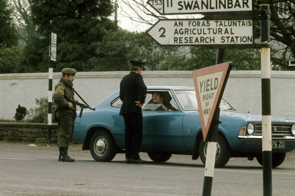 File photo dated 01/04/1974 of police and military checking cars at a border post in Swanlinbar in the Irish Republic, just south of the Ulster border.(PA).