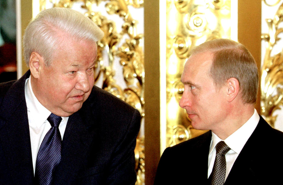 Vladimir Putin, right, and Boris Yeltsin