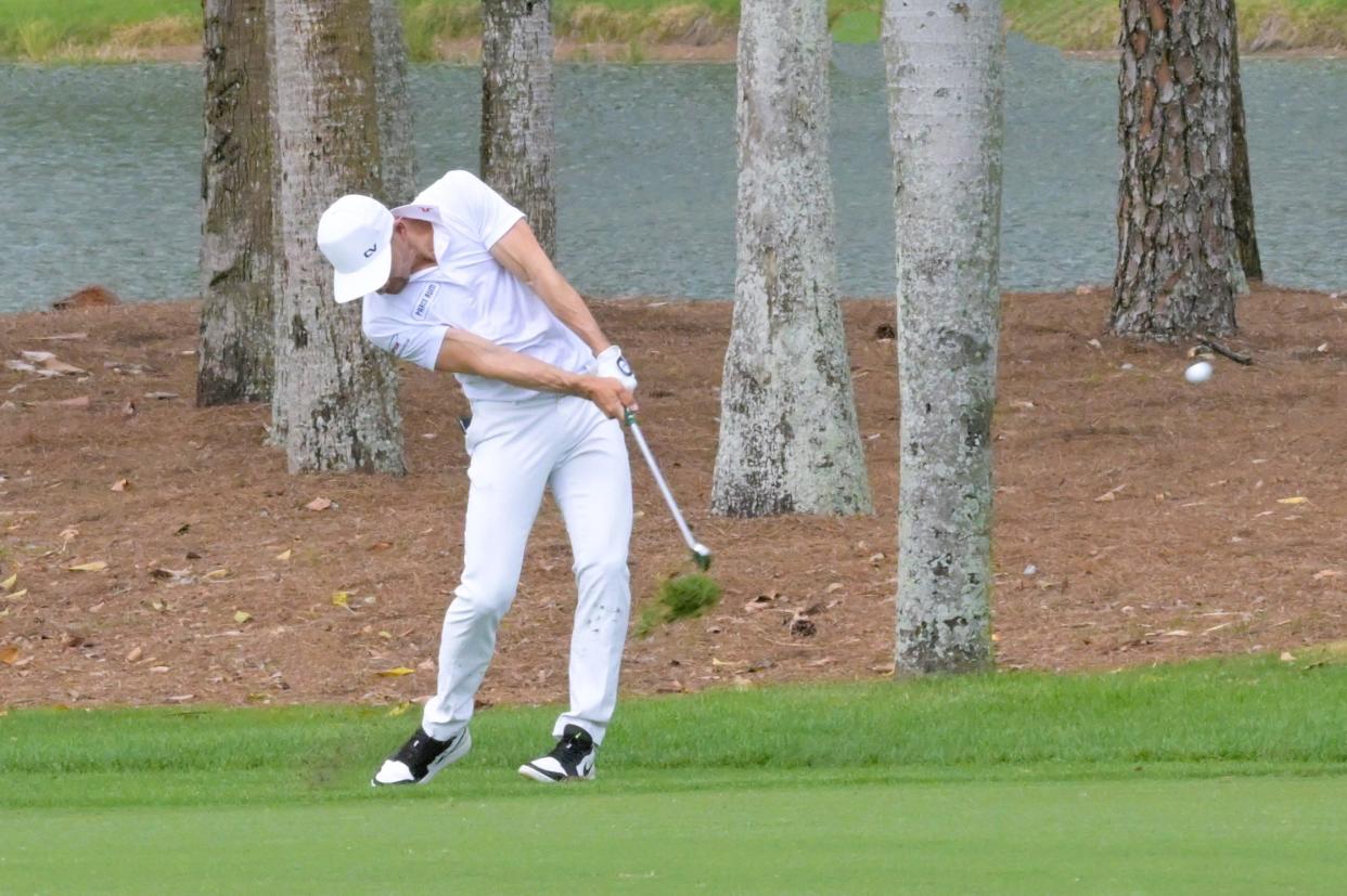 Camilo Villegas takes a fairway iron shot during the cognizant Classic at PGA National on March 2, 2024.