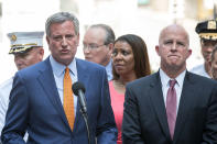 <p>New York City Mayor Bill de Blasio speaks at a press conference as New York City Police commissioner James O’Neill (R) looks on after a car struck pedestrians in Times Square, May 18, 2017 in New York City. (Photo: Drew Angerer/Getty Images) </p>