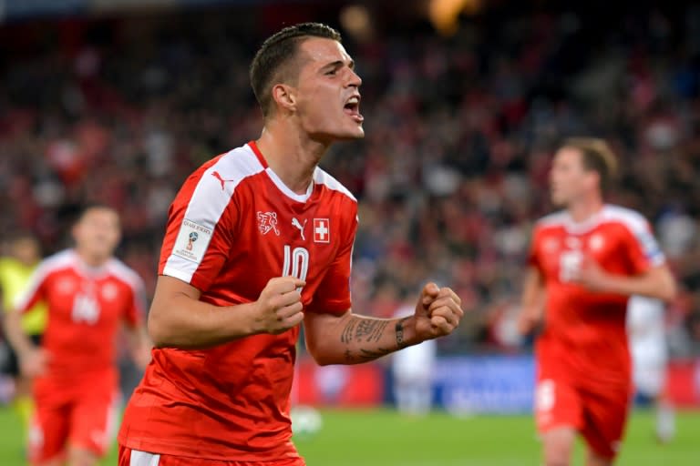 Switzerland's Granit Xhaka celebrates after scoring a goal during their FIFA 2018 World Cup qualifier match against Hungary, at the St. Jakob-Park Stadium in Basel, on October 7, 2017