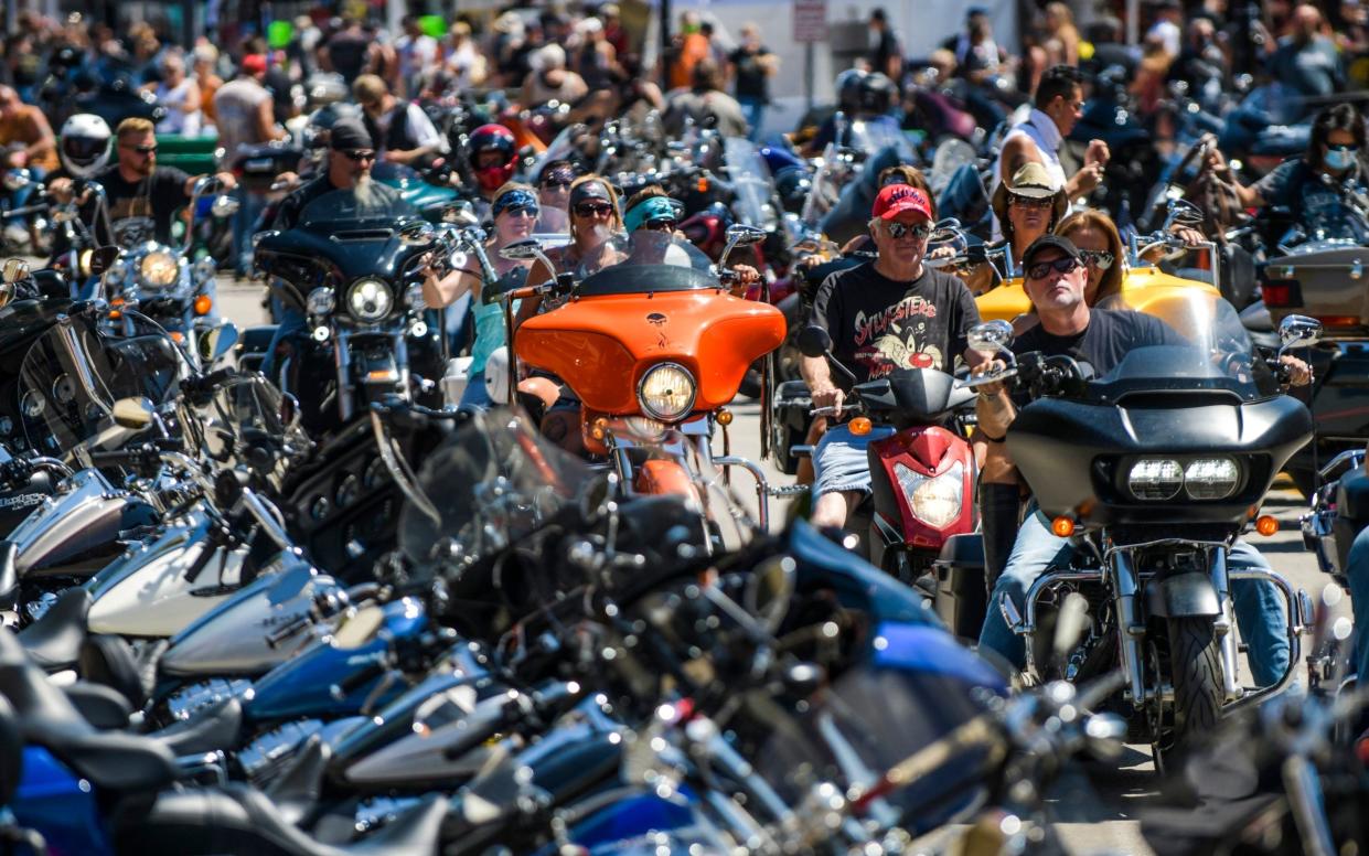 Motorcyclists ride down Main Street during the 80th Annual Sturgis Motorcycle Rally - Michael Ciaglo /Getty Images