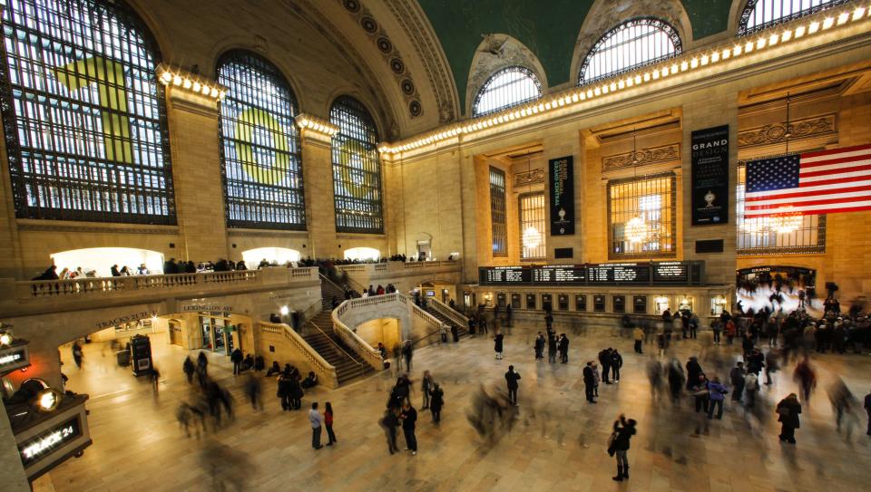 Commuters walk inside Grand Central Station in New York, February 2, 2013. Grand Central Terminal, the doyenne of American train stations, is celebrating its 100th birthday. Opened on February 2, 1913, the iconic New York landmark with its Beaux-Arts facade is an architectural gem, and still one of America's greatest transportation hubs. (REUTERS/Eduardo Munoz)