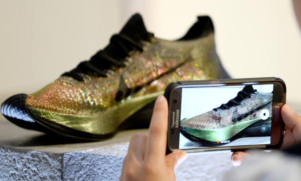 An attendee takes a picture at the launch of the Nike Zoom Vaporfly Elite Flyprint in April.