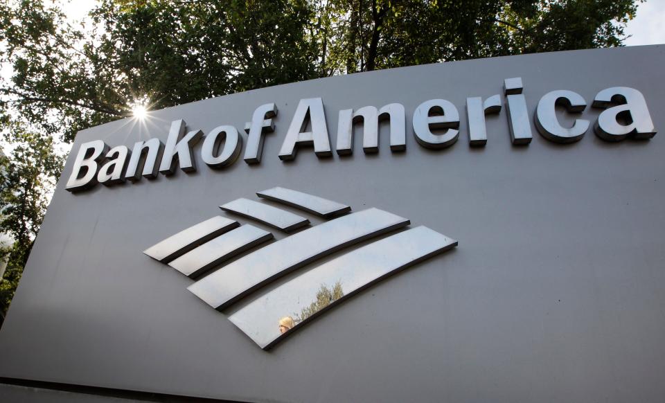 A Bank of America logo is displayed at a branch office in Palo Alto, Calif.