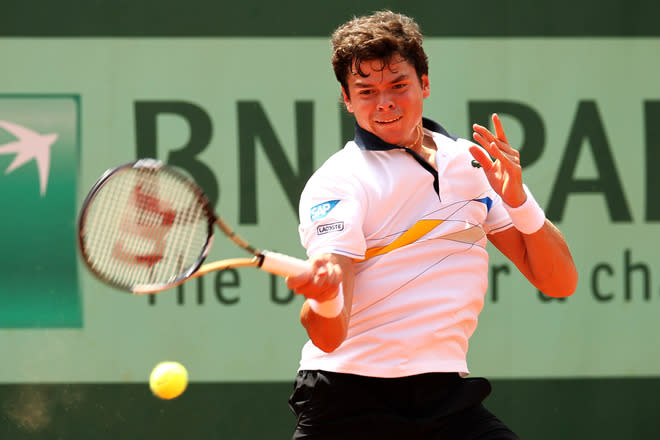 PARIS, FRANCE - MAY 31: Milos Raonic of Canada plays a forehand during his men's singles second round match against Jesse Levine of USA during day five of the French Open at Roland Garros on May 31, 2012 in Paris, France. (Photo by Matthew Stockman/Getty Images)