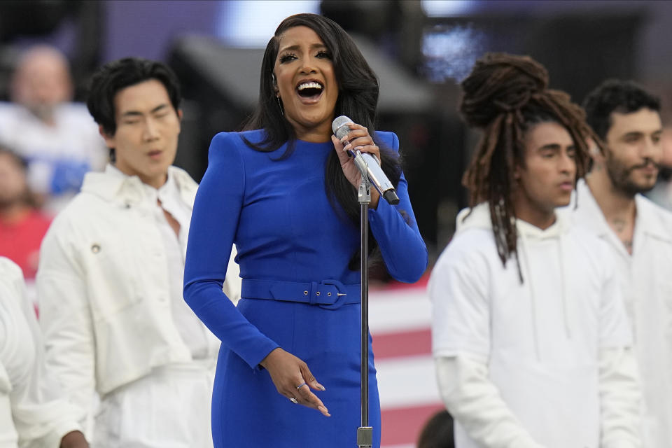 FILE - Country music artist Mickey Guyton performs the national anthem before the NFL Super Bowl 56 football game between the Los Angeles Rams and the Cincinnati Bengals, Sunday, Feb. 13, 2022, in Inglewood, Calif. Guyton turns 39 on June 17. (AP Photo/Chris O'Meara, File)