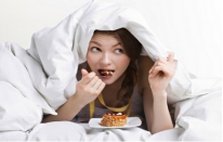 <div class="caption-credit"> Photo by: stock photo</div><b>More cravings</b> <br> Studies show that people favor unhealthy snack and junk foods when they are sleep deprived. That frontal lobe activity, which gets altered under sleep deprivation, is what governs decision-making. On top of that, sleep deprivation also increases activity in deeper brain centers that respond to rewards. Night snackers beware. Your brain is getting the better of you. <br> <i>Source: <a rel="nofollow noopener" href="http://newscenter.berkeley.edu/2013/08/06/poor-sleep-junk-food/" target="_blank" data-ylk="slk:University of California at Berkeley;elm:context_link;itc:0;sec:content-canvas" class="link ">University of California at Berkeley</a></i>