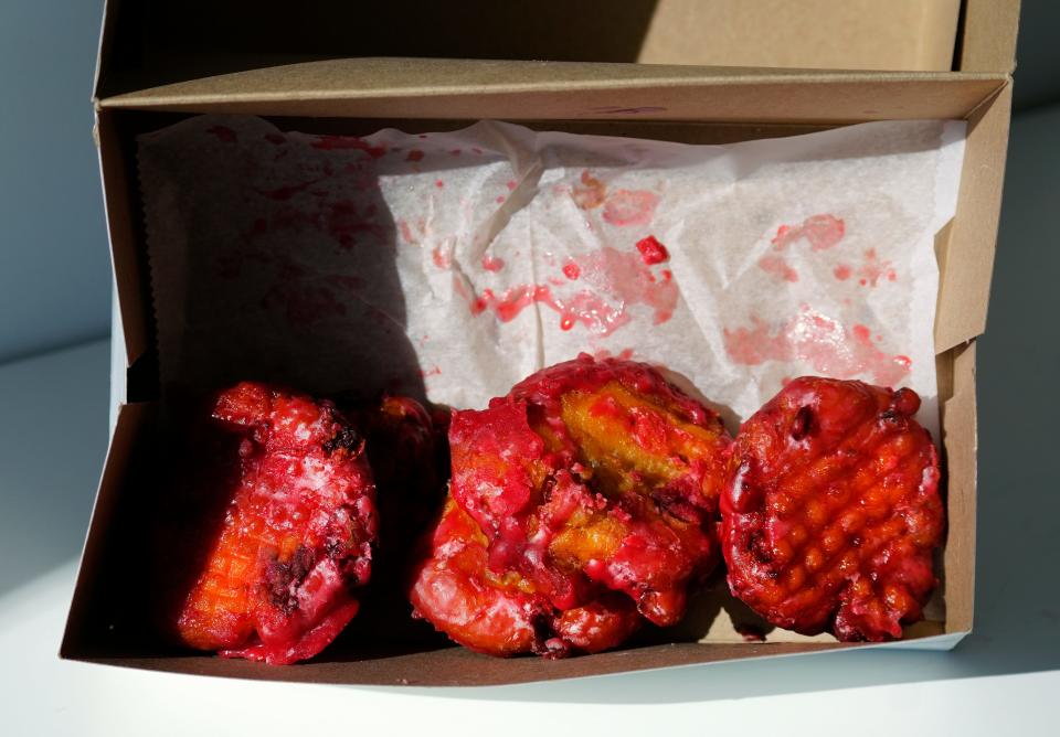 The doughnuts are cherry-filled fritters, with a cherry glaze.