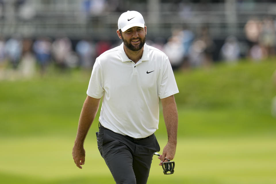 Scottie Scheffler walks to green on the 18th hole during a practice round for the PGA Championship golf tournament at the Valhalla Golf Club, Wednesday, May 15, 2024, in Louisville, Ky. (AP Photo/Sue Ogrocki)