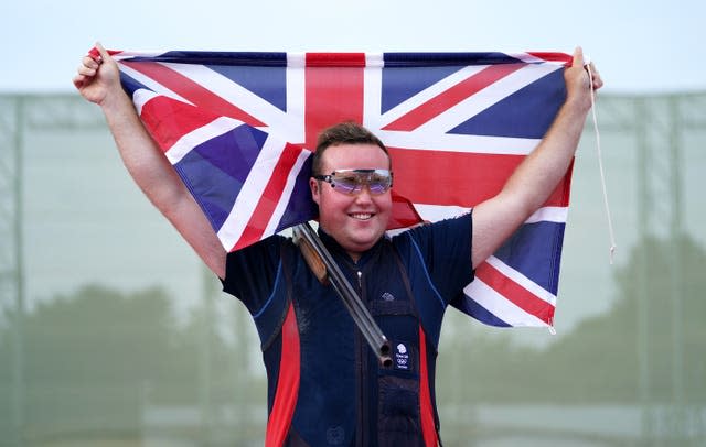 Matt Coward-Holley celebrates his bronze medal  win