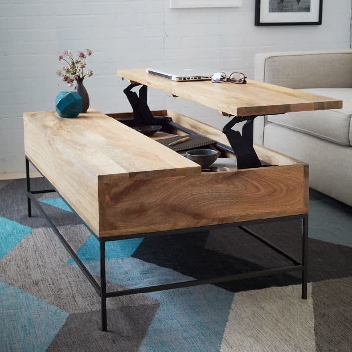 Industrial Storage Coffee Table, $599 at <a href="http://www.westelm.com/products/rustic-storage-coffee-table-g569/?pkey=csmall-space-solutions%7Csmall-coffee-side-console-tables%7C&amp;group=1&amp;sku=9089330" target="_blank">West Elm</a>