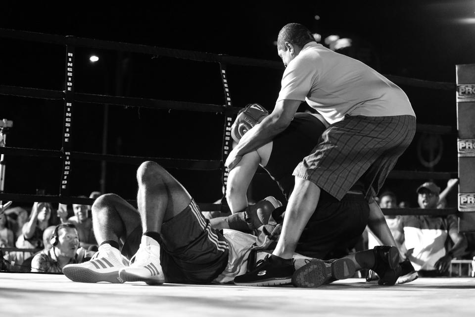 <p>Nick Albergo hovers over Paul Maurice after pushing him to the mat during a grudge match at the Brooklyn Smoker in the parking lot of Gargiulo’s Italian restaurant in Coney Island, Brooklyn, on Aug. 24, 2017. (Photo: Gordon Donovan/Yahoo News) </p>