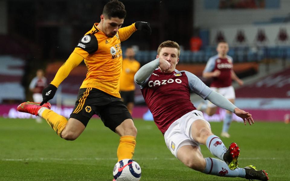 Wolverhampton Wanderers' Portuguese midfielder Pedro Neto shoots but fails to score during the English Premier League football match between Aston Villa and Wolverhampton Wanderers - AFP