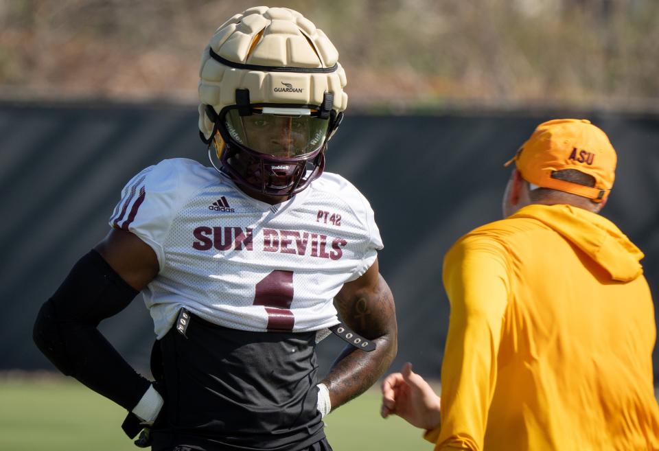 DB Jordan Clark (left) talks with head coach Kenny Dillingham during practice on Aug. 3, 2023, at ASU's Kajikawa Practice Field in Tempe.