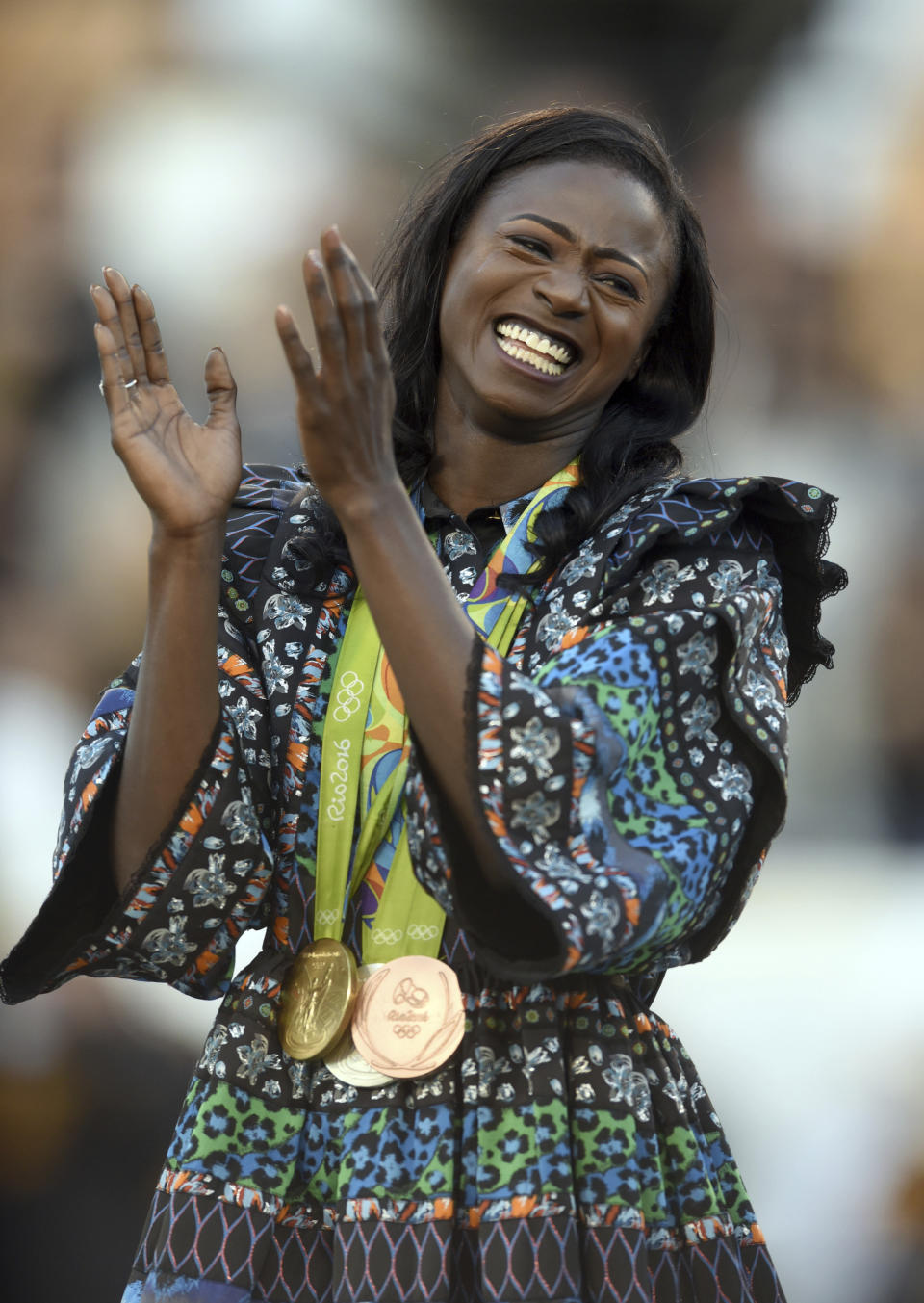 FILE - Former Southern Mississippi star and Olympic gold medalist Tori Bowie smiles during halftime of a college football game between Louisiana Tech and Southern Mississippi on Friday, Nov. 25, 2016, in Hattiesburg, Miss. Tori Bowie, the sprinter who won three Olympic medals at the 2016 Rio de Janeiro Games, has died, her management company and USA Track and Field said Wednesday, May 3, 2023. Bowie was 32. She was found Tuesday in her Florida home. No cause of death was given. (Susan Broadbridge/Hattiesburg American via AP, File)