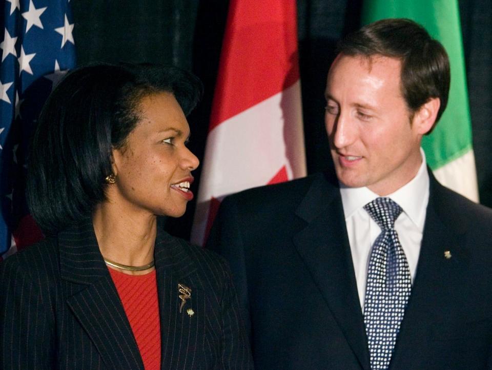 United States Secretary of State Condoleezza Rice chats with Foreign Affairs Minister Peter MacKay before the start of the Security, Prosperity and Partnership meeting in Ottawa Friday, February 23, 2007.