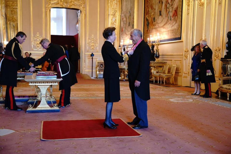 Bob Champion is made a CBE by the Princess Royal at Windsor Castle (Jonathan Brady/PA) (PA Wire)