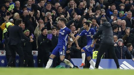 Football Soccer Britain - Chelsea v Tottenham Hotspur - Premier League - Stamford Bridge - 26/11/16 Chelsea's Pedro celebrates scoring their first goal with Gary Cahill Reuters / Stefan Wermuth Livepic