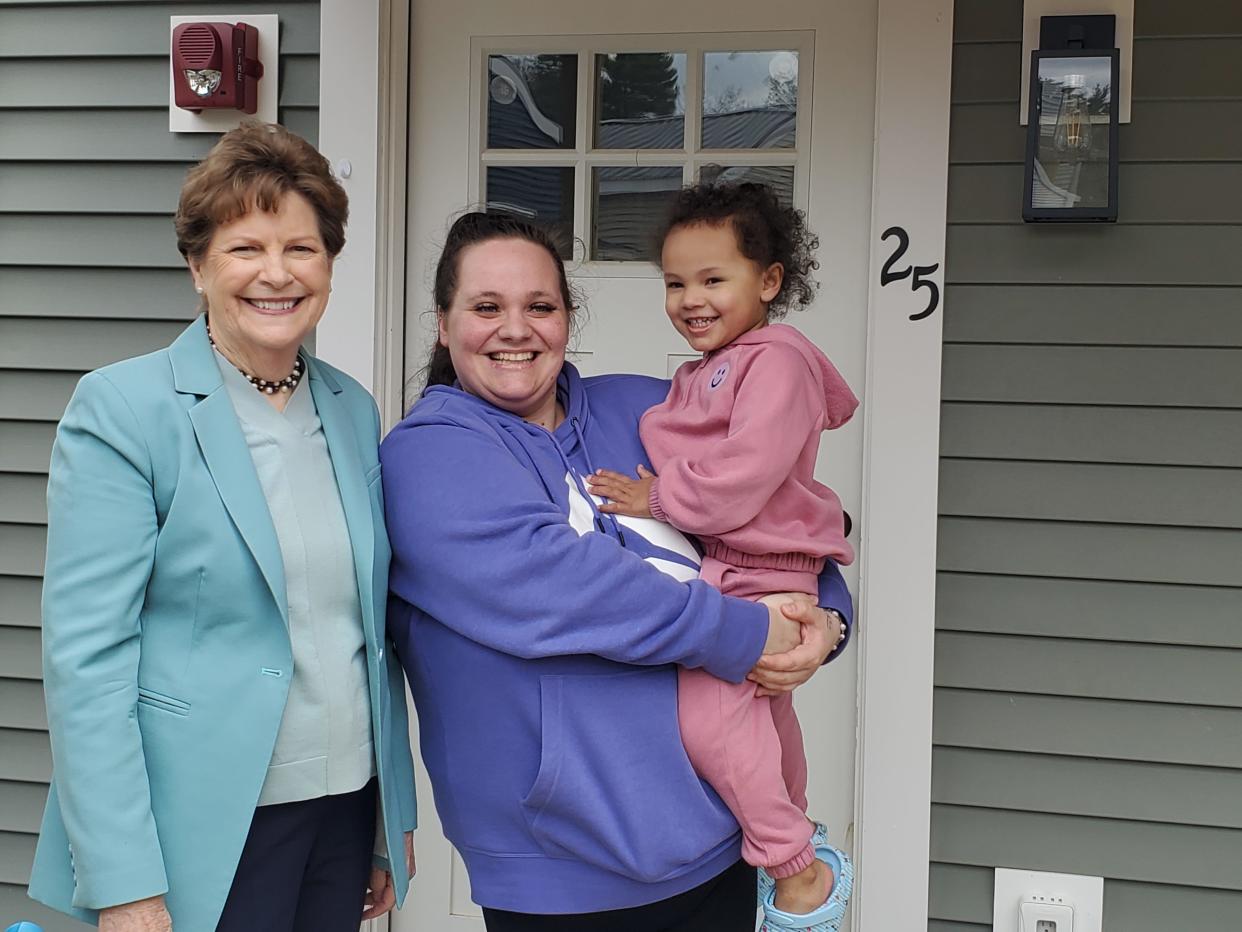 Kiana Johnston and her daughter Kylani Bryant, 2, show off their home at the Cottages at Back River Road in Dover to Sen. Jeanne Shaheen, D-New Hampshire, Friday, May 3, 2024.