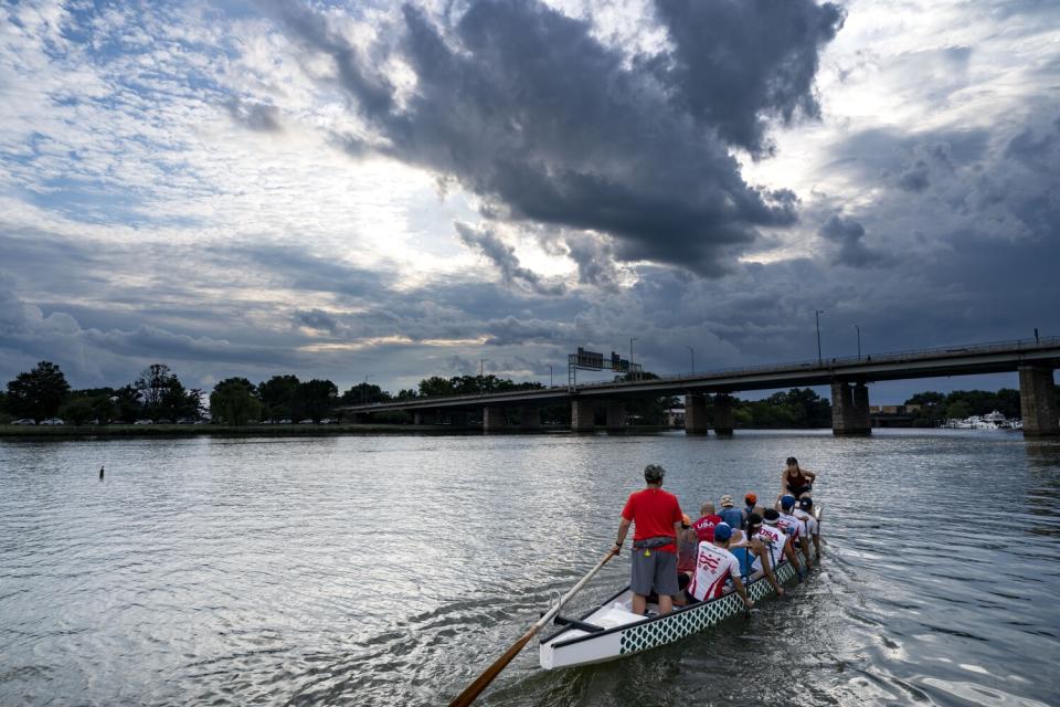 The DC Dragon Boat Club practices in the Washington Channel.