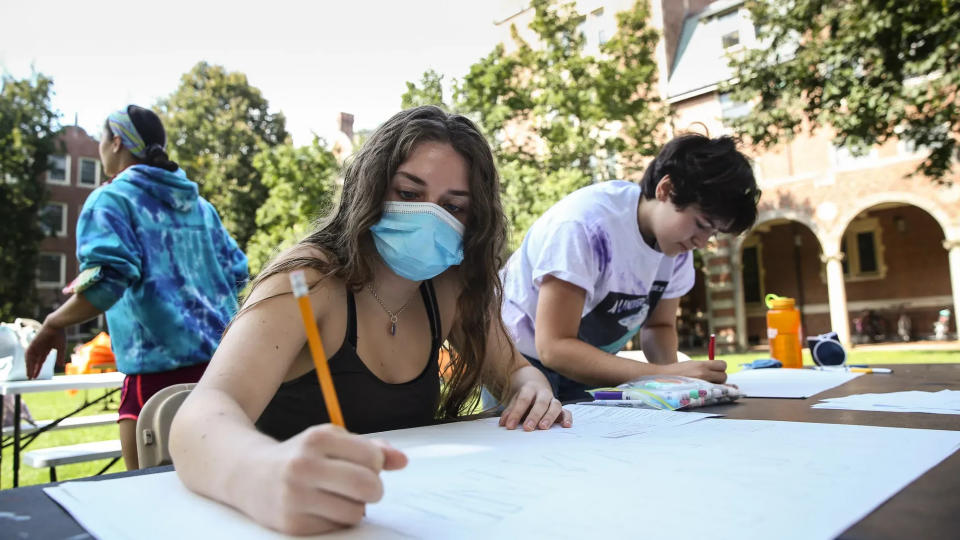 Hannah Jordanides participates in a Boston Marathon sign-making event in October 2021 at Wellesley College. The 125th edition of the Marathon was postponed six months due to COVID-19.