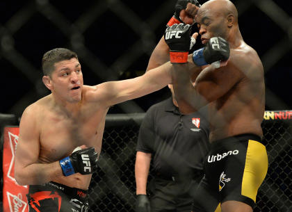 Nick Diaz punches at Anderson Silva during their UFC 183 fight. (USAT)