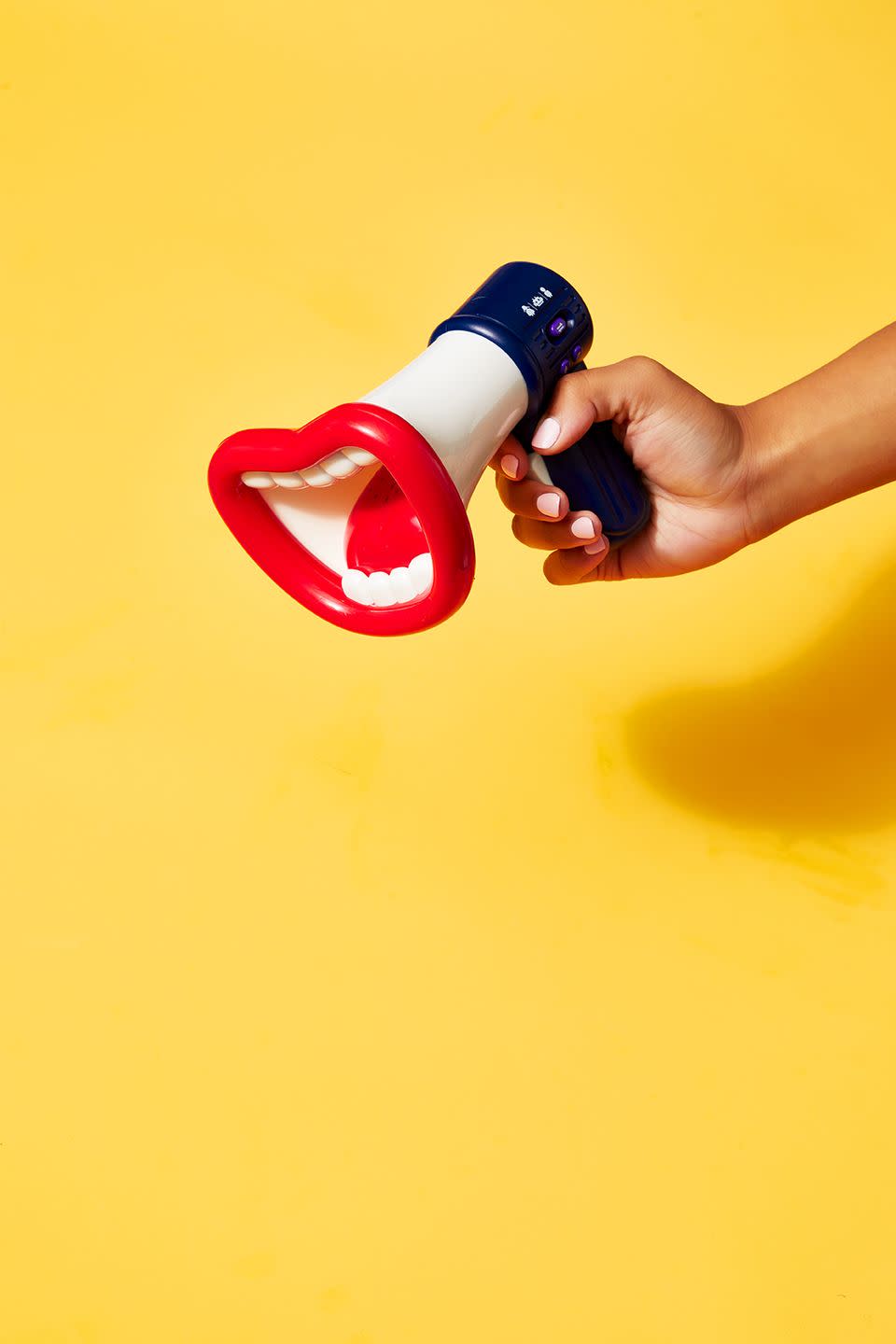 hand holding a megaphone