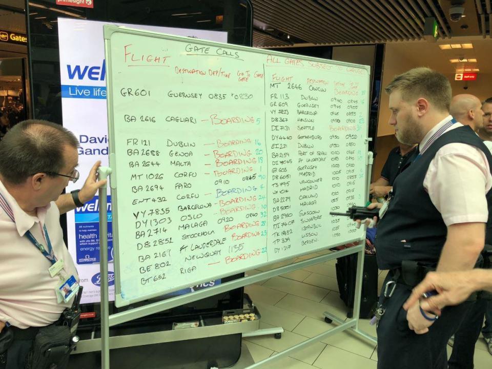 Staff resorted to writing out flight information on whiteboards (Edward von der Burg)