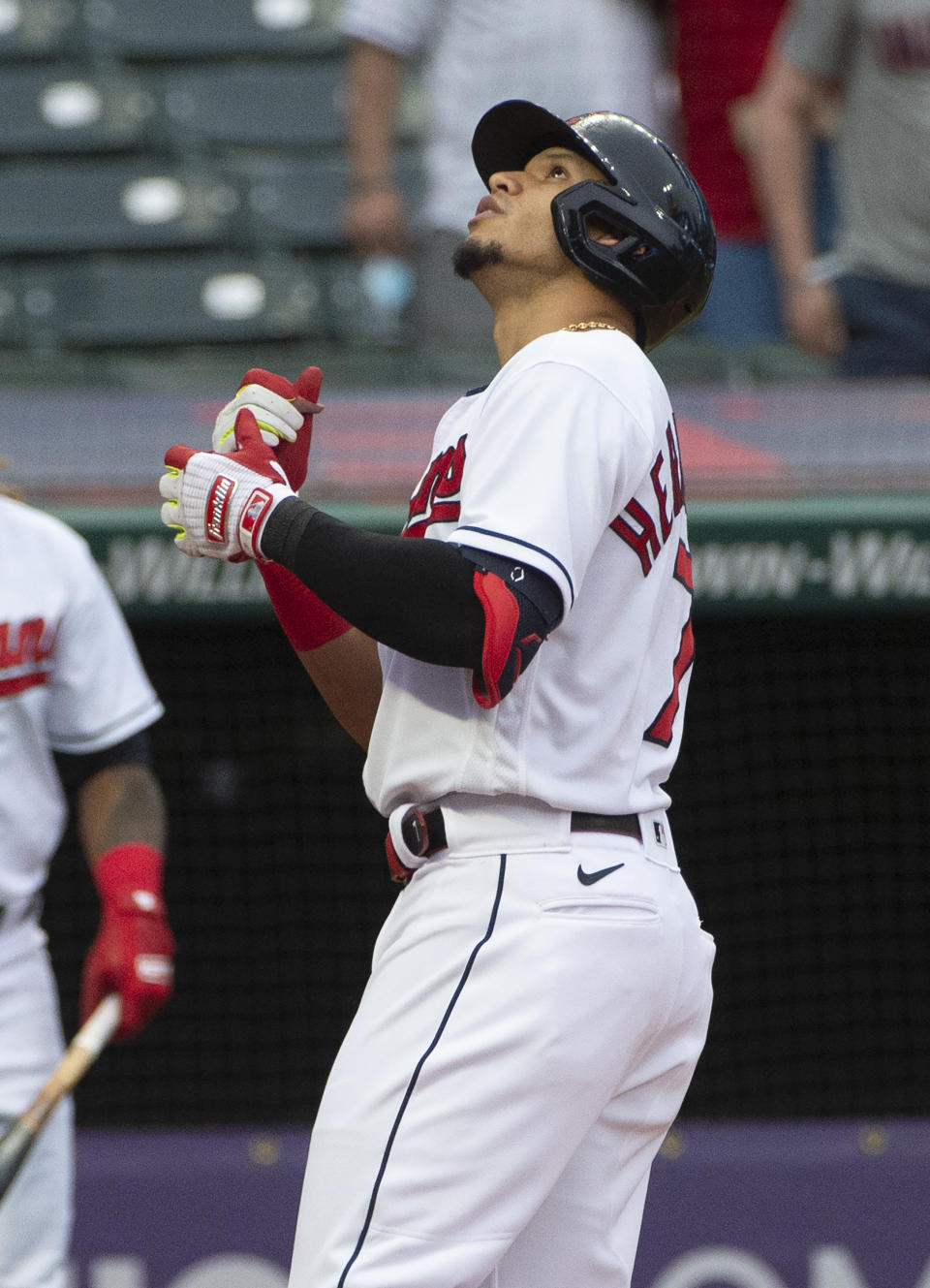 Cleveland Indians' Cesar Hernandez looks skyward after hitting a solo home run off Detroit Tigers starting pitcher Tarik Skubal during the third inning of a baseball game in Cleveland, Saturday, April 10, 2021. (AP Photo/Phil Long)