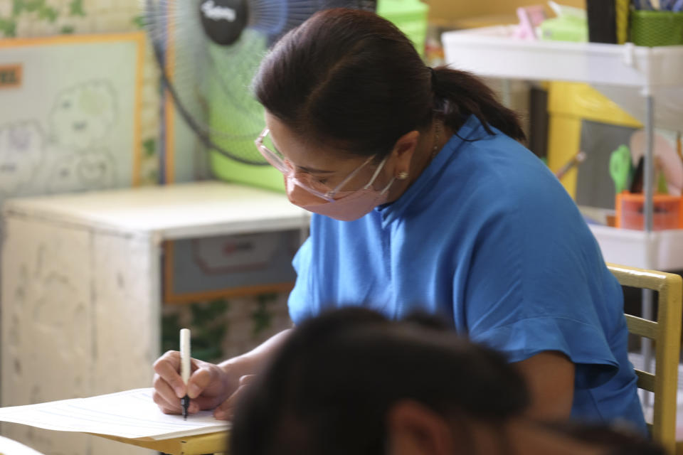 Presidential candidate and incumbent Vice President Leni Robredo votes at a school used as a polling center at Camarines Sur, eastern Philippines on Monday, May 9, 2022. About 67 million registered Filipino voters will pick a new president on Monday, with Ferdinand Marcos Jr, son and namesake of the ousted dictator leading pre-election surveys, and Robredo, who leads the opposition as his closest challenger. (AP Photo/Zalrian Sayat)