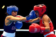 LONDON, ENGLAND - AUGUST 06: Marlen Esparza of the United States competes against Karlha Magliocco of Venezuela during the Women's Fly (51kg) Boxing Quarterfinals on Day 10 of the London 2012 Olympic Games at ExCeL on August 6, 2012 in London, England. (Photo by Scott Heavey/Getty Images)