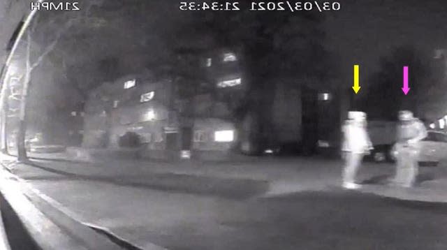 Wayne Couzens speaking to Sarah Everard by the side of the road in Poynders Court, South London (Metropolitan Police/PA)