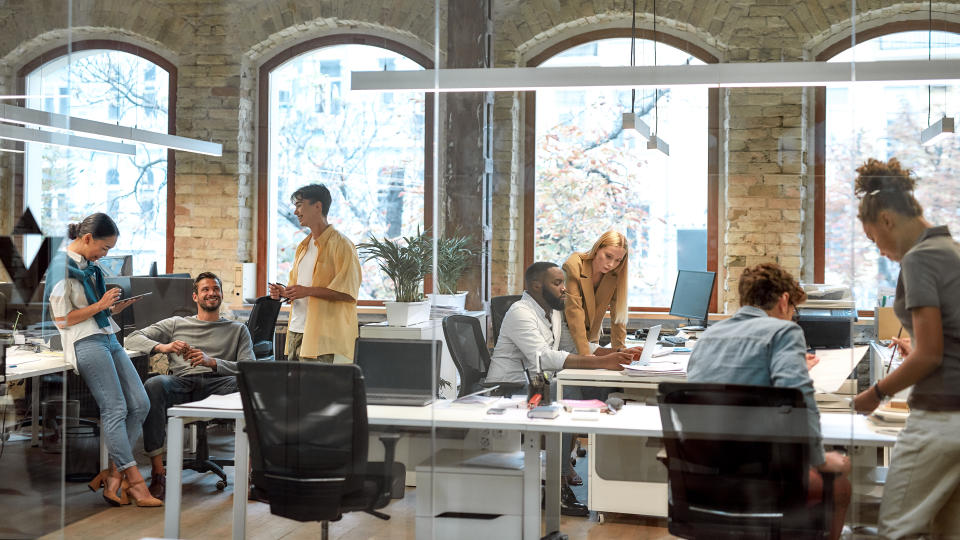 Group of mixed race business people working together in the creative office. Team building concept. Office life