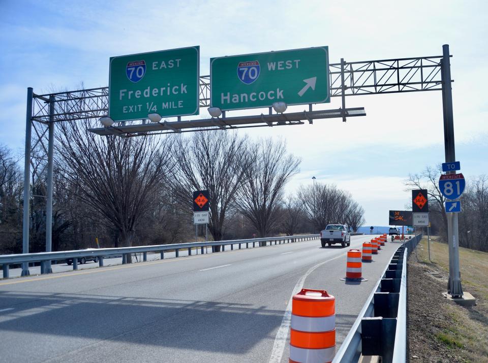 A sign for eastbound traffic on U.S. 40 heading toward Interstate 70 cautions motorists about work starting Monday. The project to improve the U.S. 40 bridge decks over I-70 is expected to be completed in 2025, weather permitting.