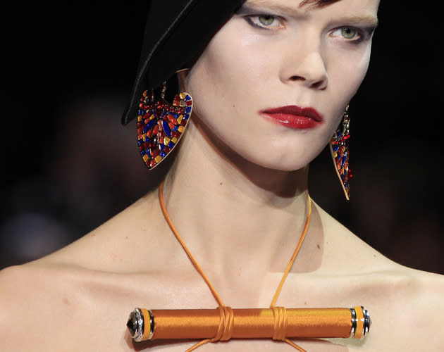 <b>Armani Prive SS13</b><br><br>The designer played with necklines with bizarre chest brooches. <br><br>©Reuters