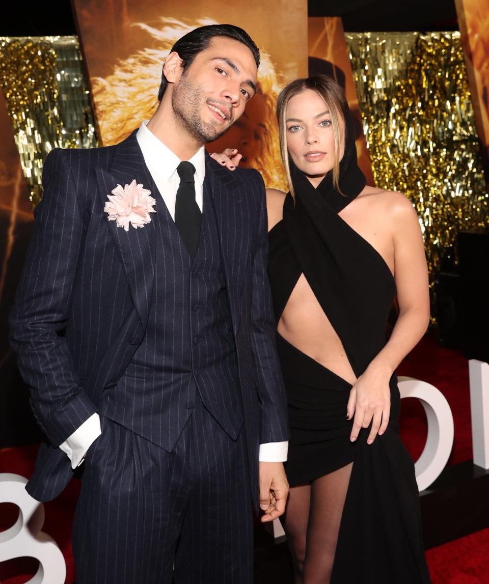 Diego Calva poses with co-star Margot Robbie at the world premiere of "Babylon."