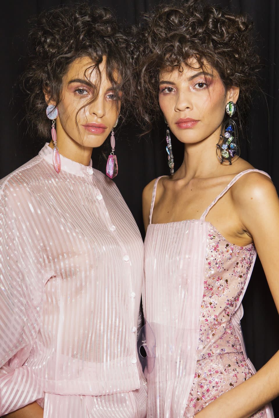 <p>A pile of mussed curls pinned atop the head at Giorgio Armani.</p>