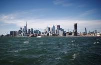 Toronto skyline stands on the waterfront before Alphabet Inc, the owner of Google, announced the project "Sidewalk Toronto", that will develop an area of Toronto's waterfront using new technologies to develop high-tech urban areas in Toronto, Ontario, Canada October 17, 2017. REUTERS/Mark Blinch